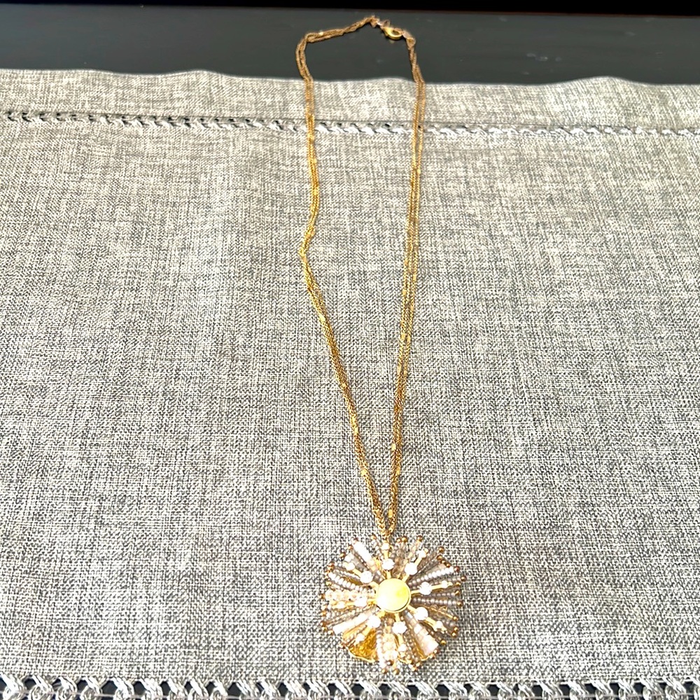 Long, gold flower necklace